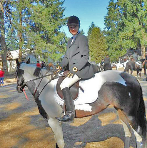 Photo of Monica riding a horse