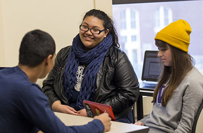 Students discussing class project