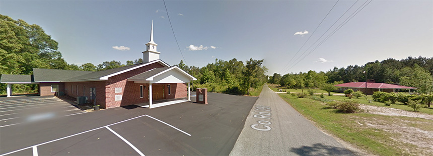 Google Street View image of East Baptist Church (left) and Lange's childhood home near Pachuta, Miss.