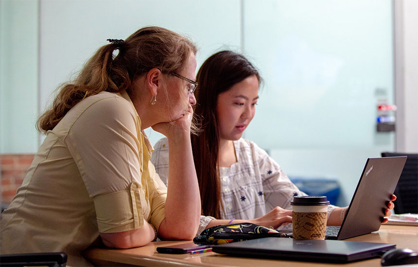 UW Tacoma Professor Martine De Cock, at left, and Computer Science & Systems graduate student Ariel Todoki