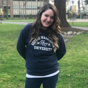 Woman in blue sweatshirt