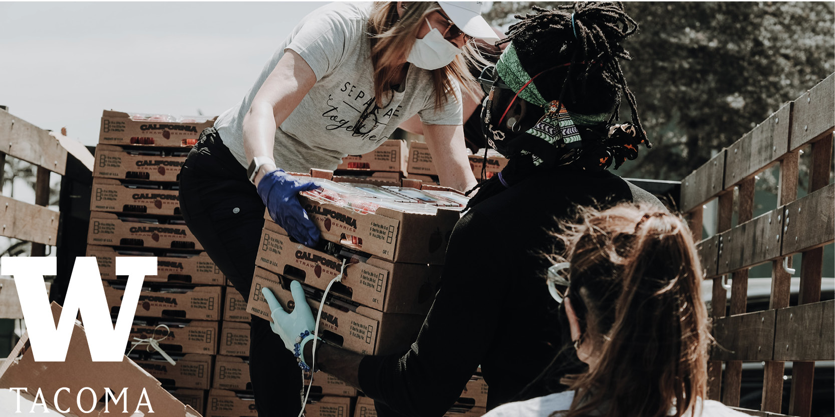 people unloading a truck