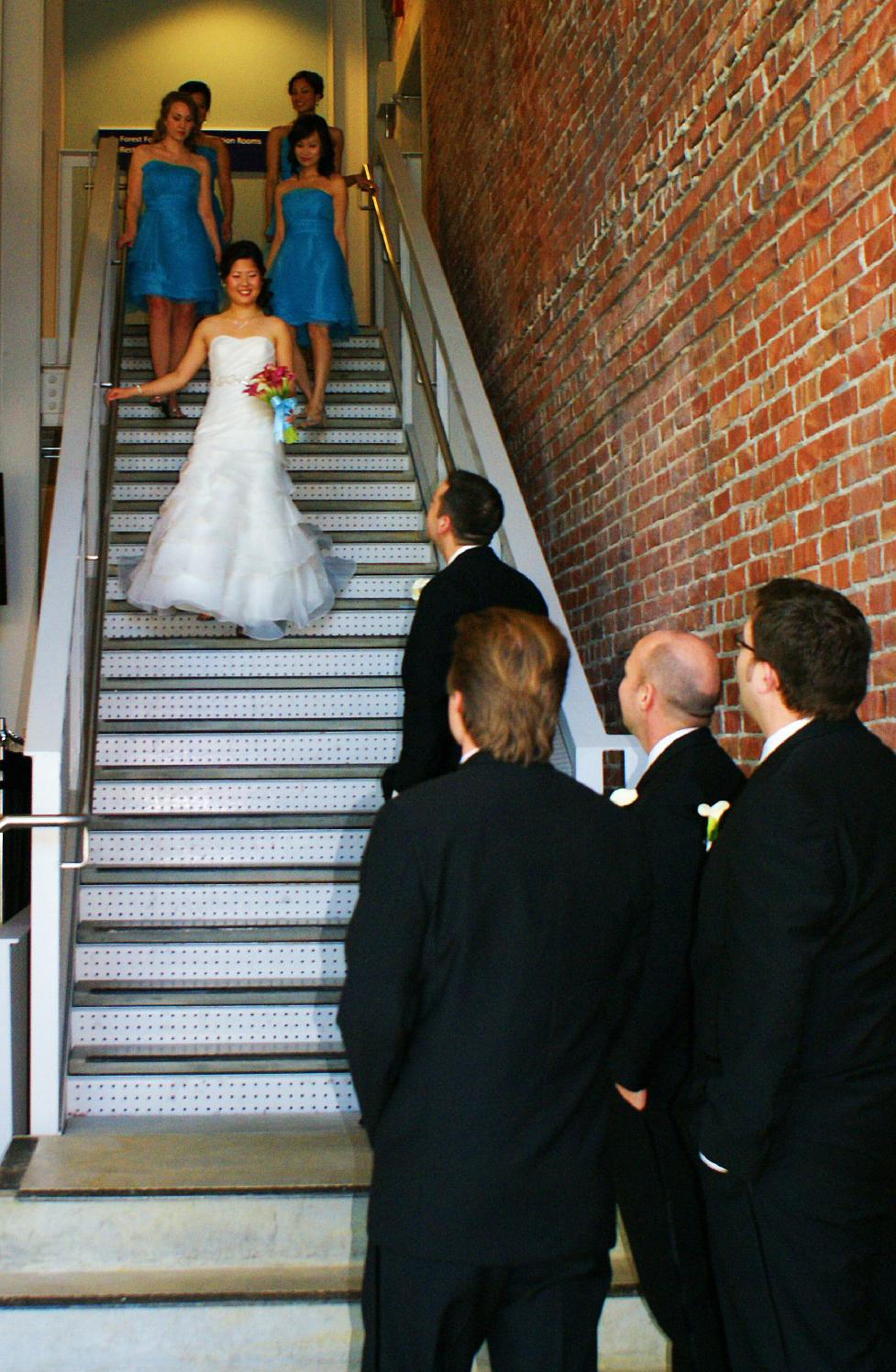 Bride coming down stairs