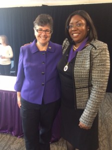 Regina Harper, '17, posing with UW President Ana Mari Cauce.