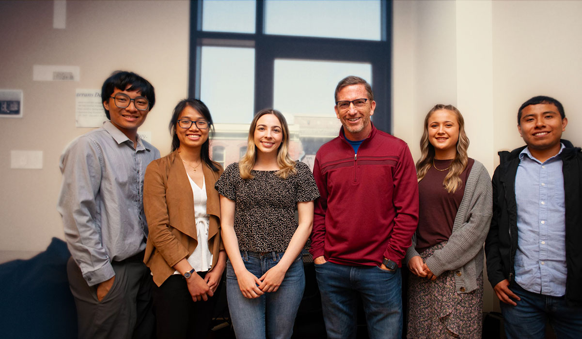 Steve Buchanan (in red) with students