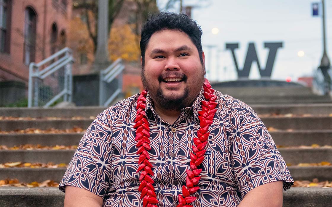 Nestor Enguerra, Jr., with UW Tacoma Grand Staircase and steel W in background