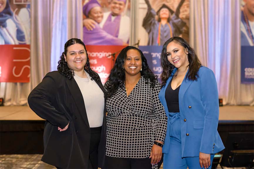 Exita Lealofi, '23, left and Courtney Acoff, '10, right with College Success Foundation - Tacoma Executive Director Senait Habte, center.