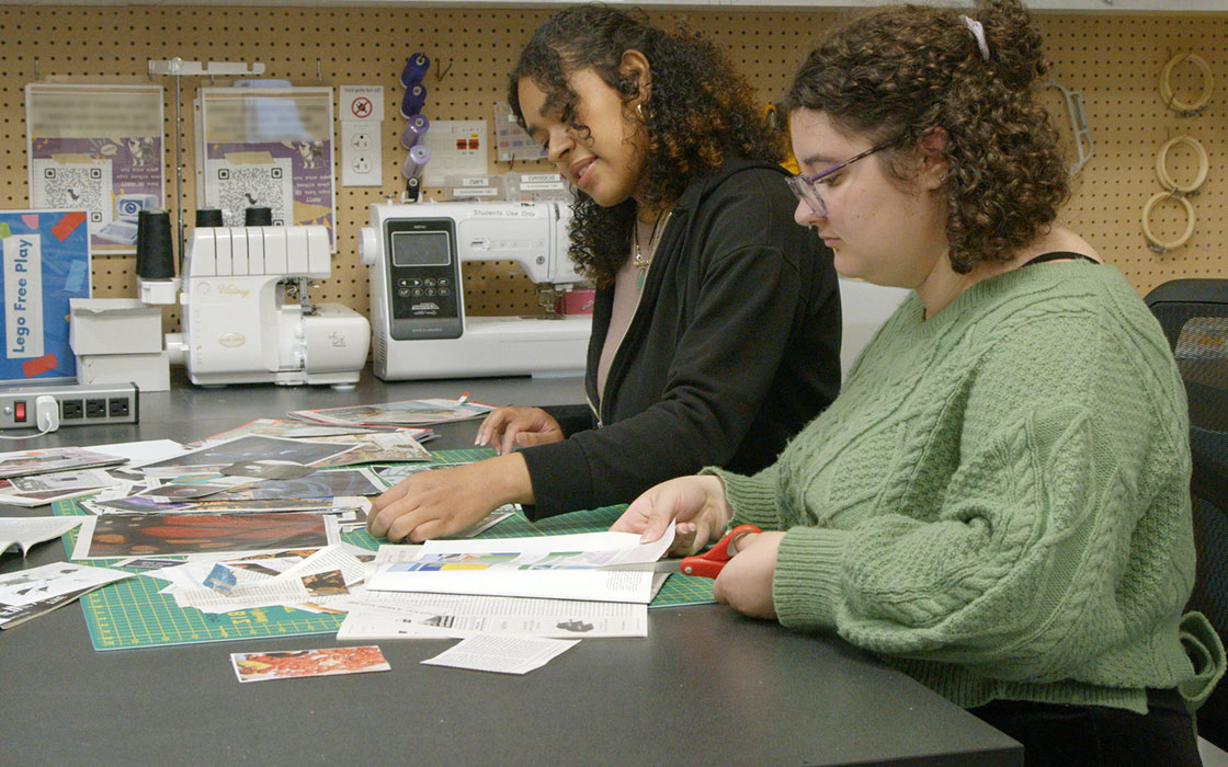 Students working on collage in the Makerspace