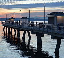 Fishing pier on Puget Sound at sunset