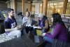 Four students study together in a university building