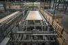 Interior of Kalesnikoff mass timber plant showing cross-laminated timber panel being fabricated.