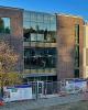 Milgard Hall on UW Tacoma campus with construction fence and cones