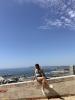 Student Sitting on top el Castillo de Santa Barbra 