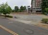 Photo of the entrance of the TPS hourly parking lot on the UW Tacoma campus.