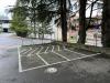 Motorcycle parking stalls located behind the Pinkerton building on Court C.