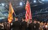 Military color guard presenting U.S. flag at Tacoma Dome.