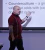 Professor Eric Madfis lecturing in front of a class